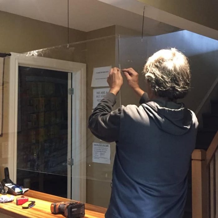 Plexi-glass Installed over front desk Installing plexi-glass